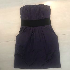 Strapless semi formal mini dress with pockets